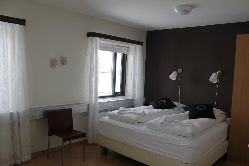 Skjaldarvik Guesthouse Акурейри Стая снимка
